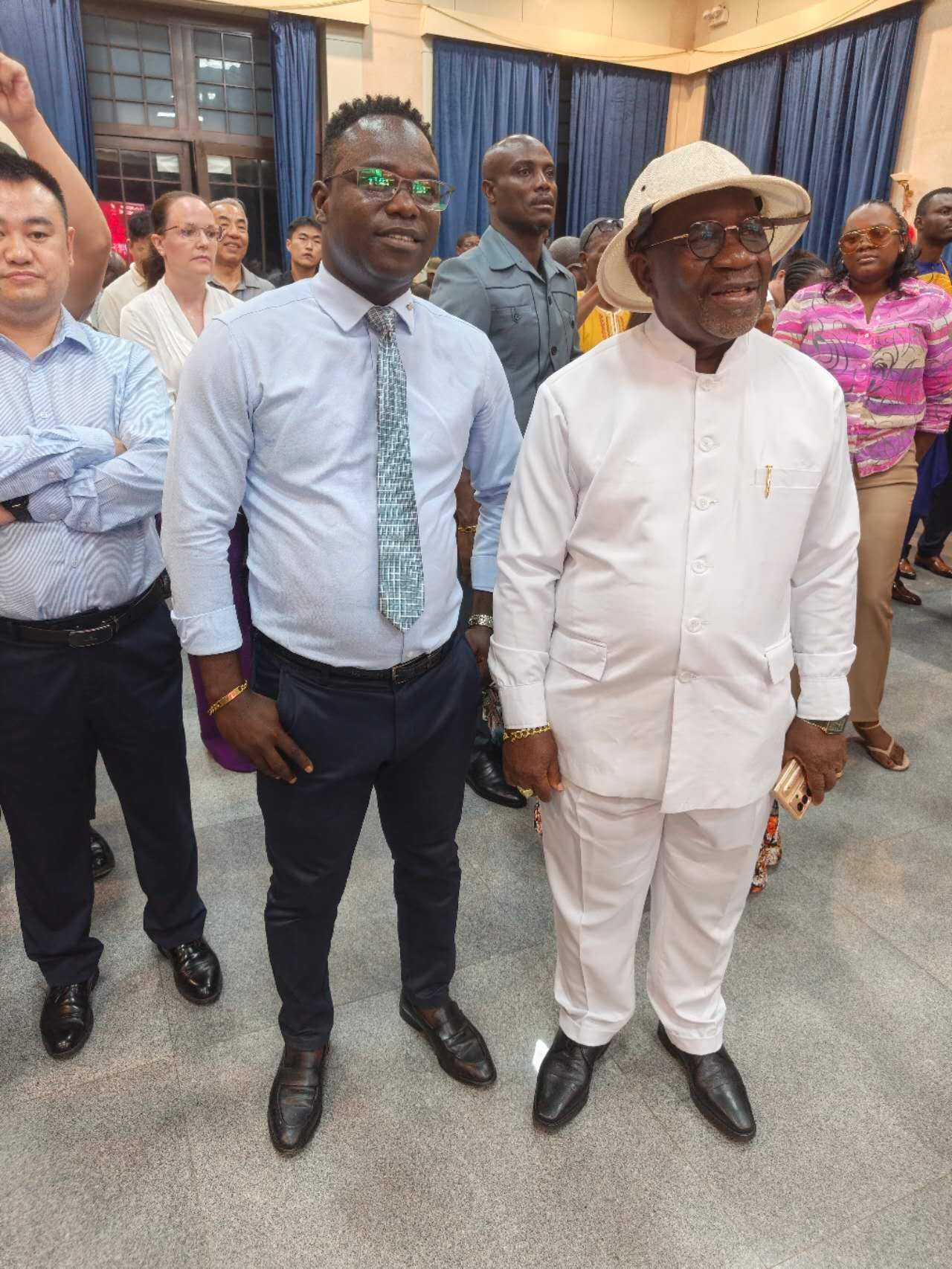 Dr. Emmanuel Fred with Cllr. Cooper W. Kruah, Sr., Minister of Labour of the Republic of Liberia.